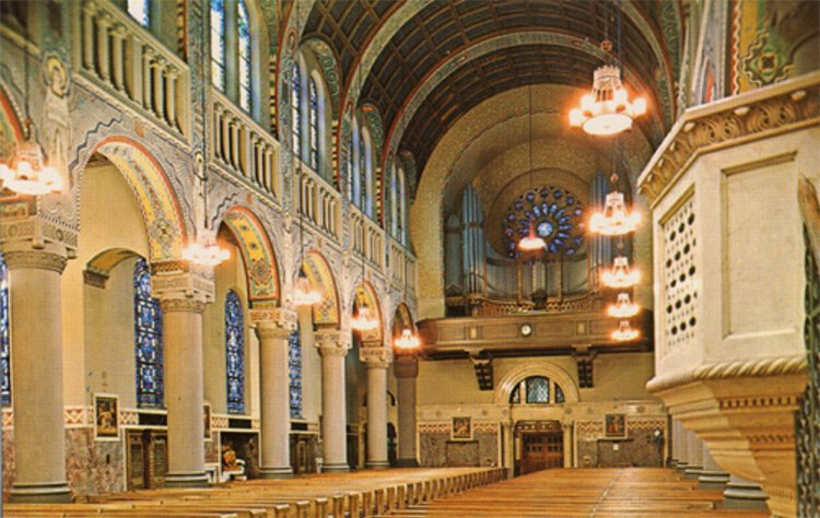 St. Agnes Church gallery was spacious enough to contain a large organ and places for a hundred singers in the desired circular formation achieved without shadowing the back pews.