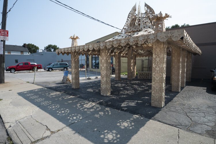 Ascent: One's journey to the heavens through ornate floral and geometric woodwork. Located at 43rd and Detroit by artist/designer/engineer/Builder Dave Biro.