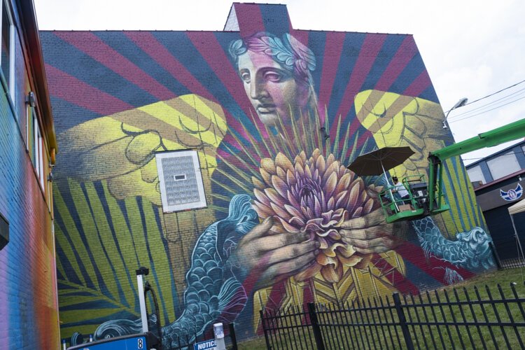 International artist Beau Stanton’s mural in the St. Clair Superior neighborhood in collaboration with Graffiti HeArt.
