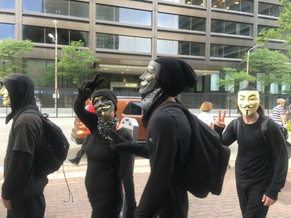 Masked protestors at the RNC