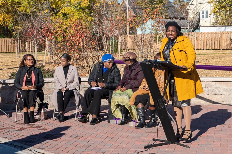 Joy Johnson, Burten Bell Carr Development, Inc. speaking at the grand opening of Garden of Eleven Angels.
