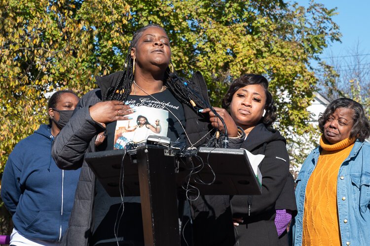 Family members of the Eleven Angels speak about their loved ones at the grand opening.