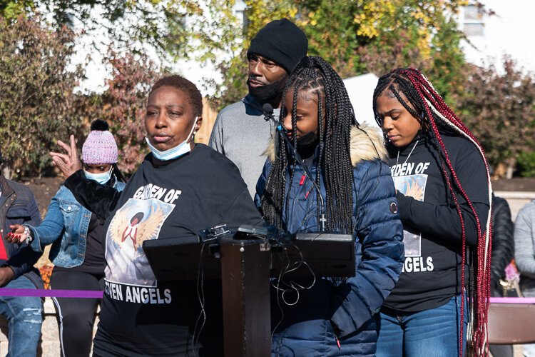 Family members of the Eleven Angels speak about their loved ones at the grand opening.