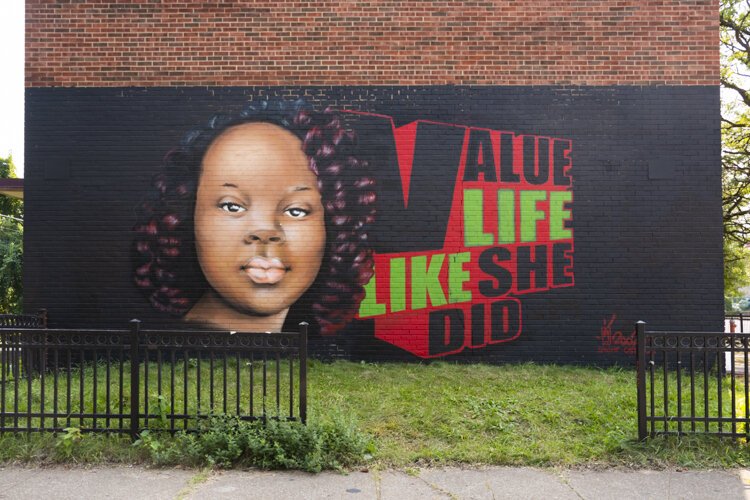 Artist Osman Swimr Muhammad’s temporary mural on a slated for demolition building on W25th Street.