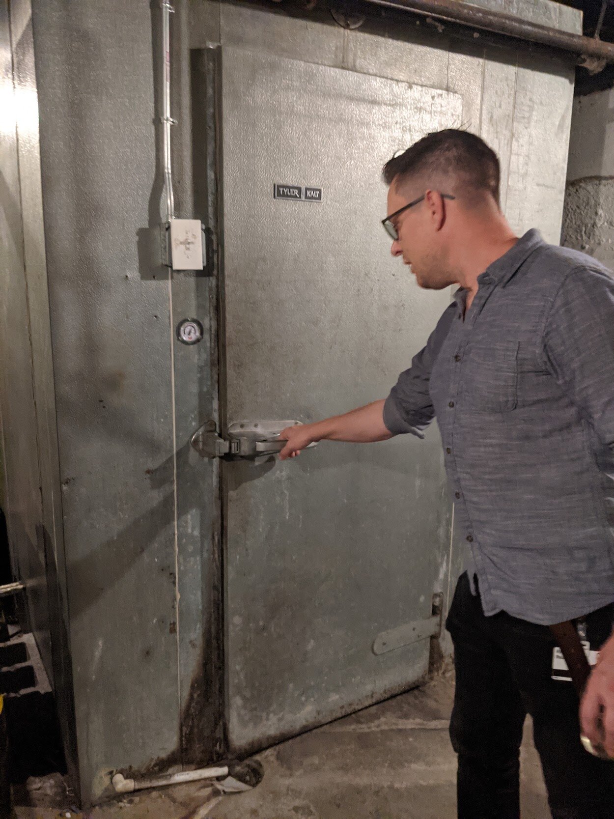 Richard Read leads the way into the hidden and haunted nooks and crannies of the basement.