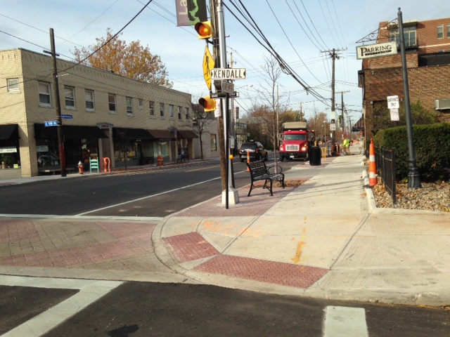 Larchmere streetscape with decorative brick crosswalks